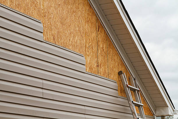 Professional Siding Repair technician working in Harrisburg, NC